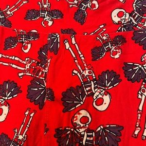 Goth spooky winged skeleton leggings